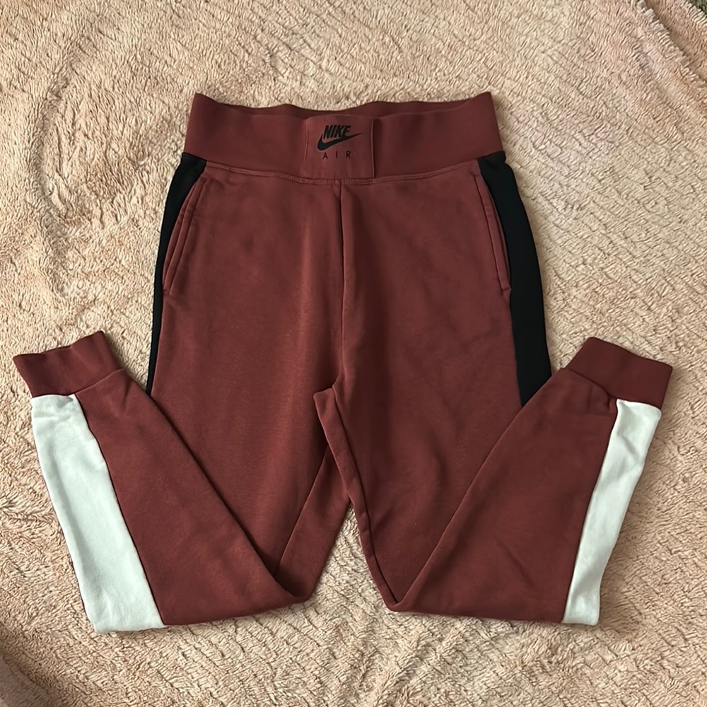 Nike Red Track Pants with Black Accents